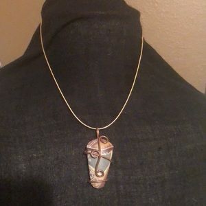 18k snake chain with Rock oval pendant